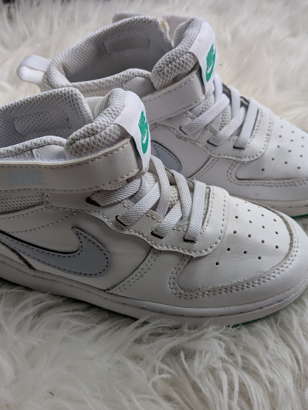 Nike Kids White High-Top Sneakers with Green Swoosh